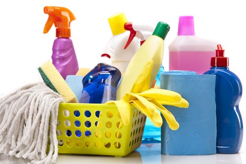 Deep cleaning a fabric sofa with specialist equipment